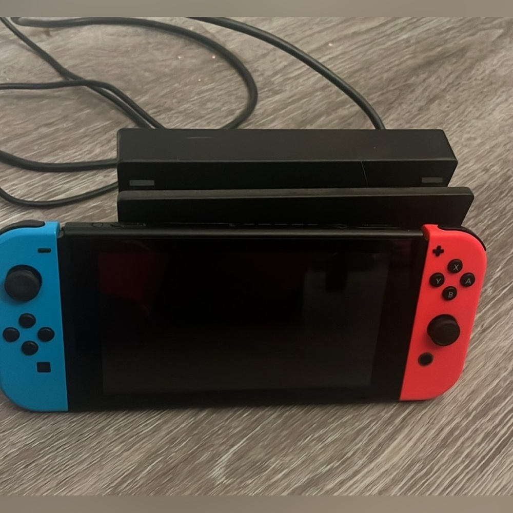 Nintendo Switch with Neon Red and Neon Blue